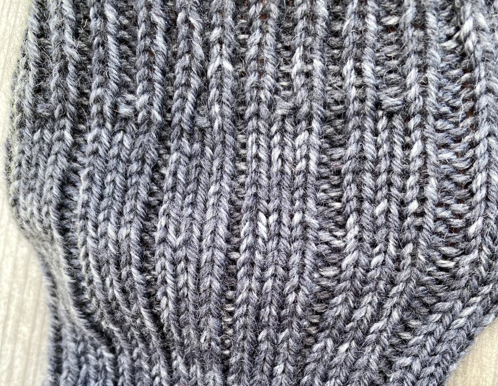 close up of drops fiesta knit sock